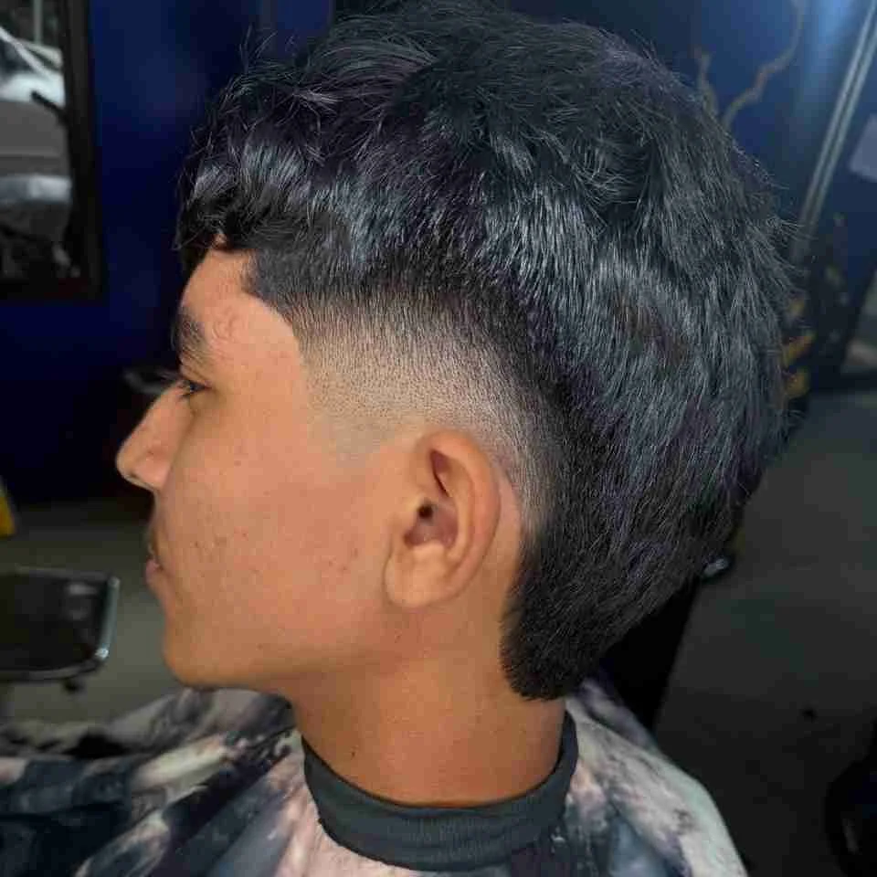 Textured haircut falling forward