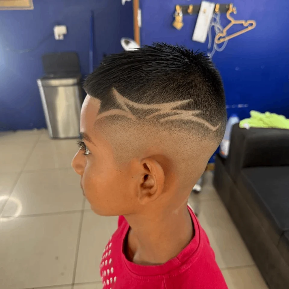 Children’s haircut with a side design
