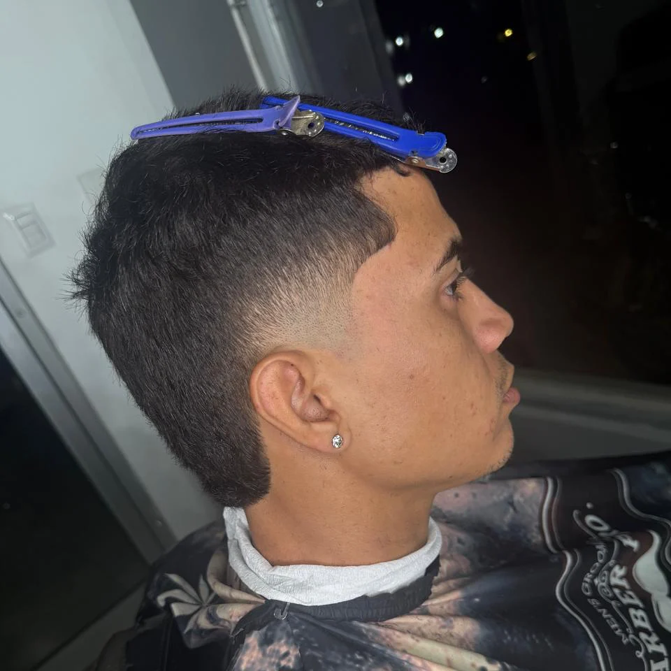 Dark burst fade with length kept at the back